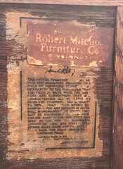  Signed with the firms paper label on reverse, partially obstructed by the furniture retailers label affixed over it.